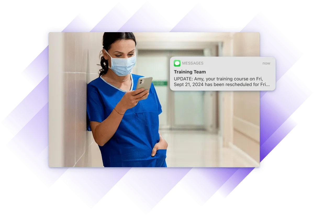 Screenshot of medical professional looking at their phone and reading a notification.