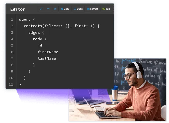 Developer using a code editor for Administrate DX.
