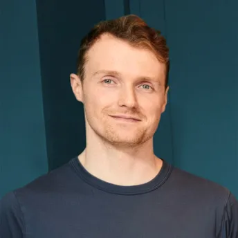 Headshot of Iain.